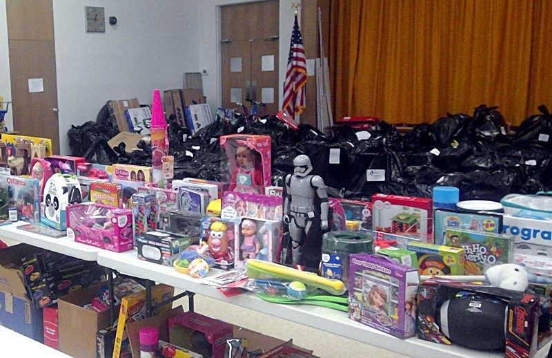 New and gently used children's gift items await distribution day in the Park Street Cafeteria las