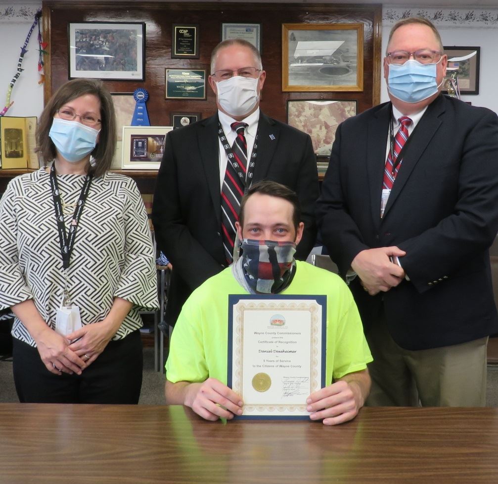 Daniel Dexheimer  with the Commissioners marking five yearsof service to the people of Wayne County.